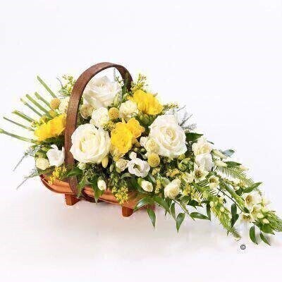 <h1>Sympathy Flowers in a Basket</h1>
<br>
<ul>
<li>Approximate size: 78 x 22cm</li>
<li>Hand-arranged yellow and white flowers in oasis and presented in a trug basket</li>
<li>To give the best occasionally we may make substitutes</li>
<li>Funeral Flowers will be delivered at least 2 hours before the funeral</li>
<li>For delivery area coverage see below</li>
</ul>
<br>
<h2>Liverpool Flower Delivery</h2>
<p>We have a wide selection of Funeral Baskets offered for Liverpool Flower Delivery. Funeral Baskets can be provided for you in Liverpool, Merseyside and we can organize Funeral flower deliveries for you nationwide. Funeral Flower can be delivered to the Funeral directors or a house address. They can not be delivered to the crematorium or the church.</p>
<br>
<h2>Flower Delivery Coverage</h2>
<p>Our shop delivers funeral flowers to the following Liverpool postcodes L1 L2 L3 L4 L5 L6 L7 L8 L11 L12 L13 L14 L15 L16 L17 L18 L19 L24 L25 L26 L27 L36 L70 If your order is for an area outside of these we can organise the delivery for you through our network of florists. We will ask them to make as close as possible to the image but because of the difference in stock and sundry items, it may not be exact.</p>
<br>
<h2>Liverpool Funeral Flowers | Baskets</h2>
<p>This traditional extra-large trug basket filled with roses, spray roses, carnations and scented freesias hand-arranged with green foliage into a basket is a classic choice.</p>
<p>Funeral Baskets are suitable as funeral flowers or as tribute gifts to the bereaved family. Baskets are suitable to come from either the friends or family of the deceased. The un funereal look of Basket arrangements means they are often sent to a cremation by people who wish for the flowers to be enjoyed after the funeral by being given to local care homes for example.</p>
<p>Contains: 3 yellow craspedia, 5 yellow freesia, 1 white lisanthus, 4 white ornithogalum, 5 white short-stem roses, 1 yellow solidago, 2 white spray rose and 2 yellow carnation together with mixed seasonal foliages hand-arranged into a trug basket.</p>
<br>
<h2>Best Florist in Liverpool</h2>
<p>Trust Award-winning Liverpool Florist, Booker Flowers and Gifts, to deliver funeral flowers fitting for the occasion delivered in Liverpool, Merseyside and beyond. Our funeral flowers are handcrafted by our team of professional fully qualified who not only lovingly hand make our designs but hand-deliver them, ensuring all our customers are delighted with their flowers. Booker Flowers and Gifts your local Liverpool Flower shop.</p>
<br>
<p><em>Vivian Hart - Review from Facebook - Funeral Flowers Liverpool</em></p>
<p><em>This 5 Star review was from Facebook - Booker Flowers and Gifts - Reviews Facebook</em></p>
<p><em>Visited Booker Flowers as my usual florist was closed. Ordered funeral flowers. The advice and customer service we were given was excellent. The flowers exceeded our expectations - will be using Booker Flowers in the future - Thank you</em></p>